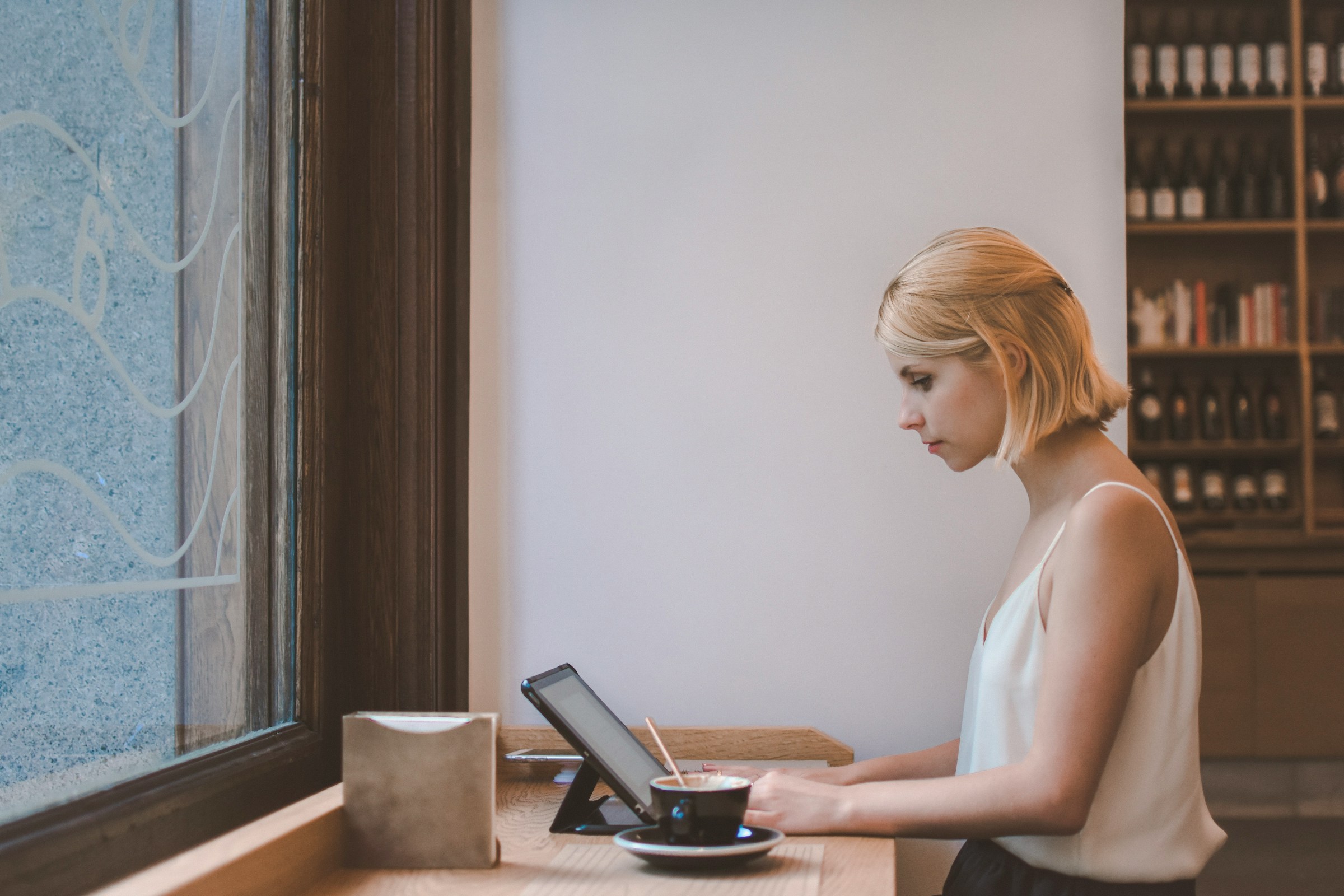 woman using laptop - Enterprise SEO Tools