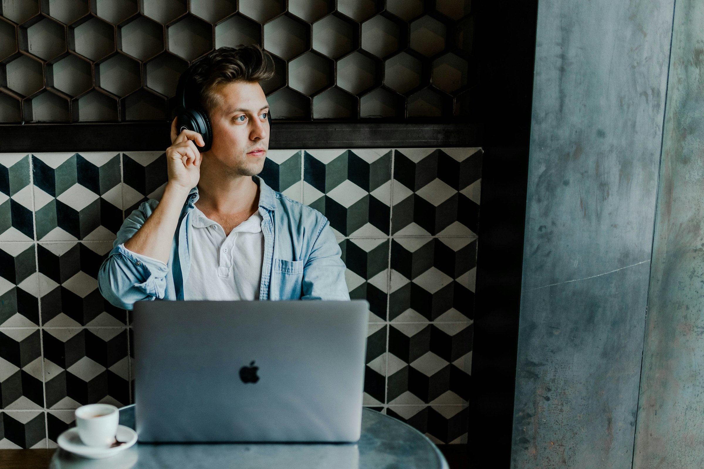 man working while listening to music - Automatic Blog