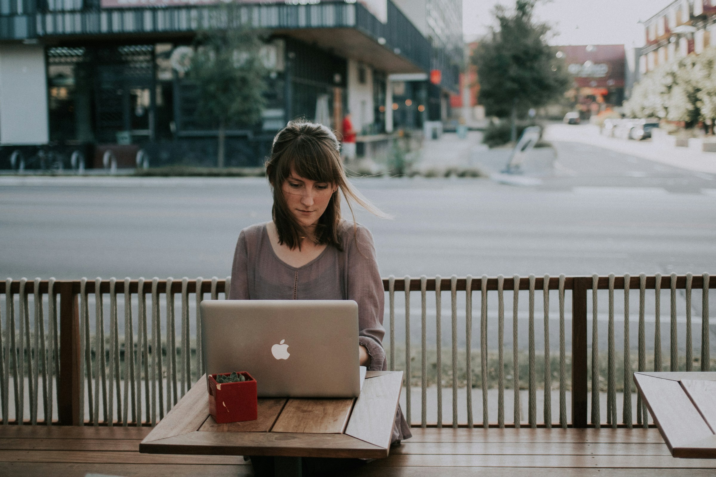 Woman Using Laptop - Wordtune Alternative