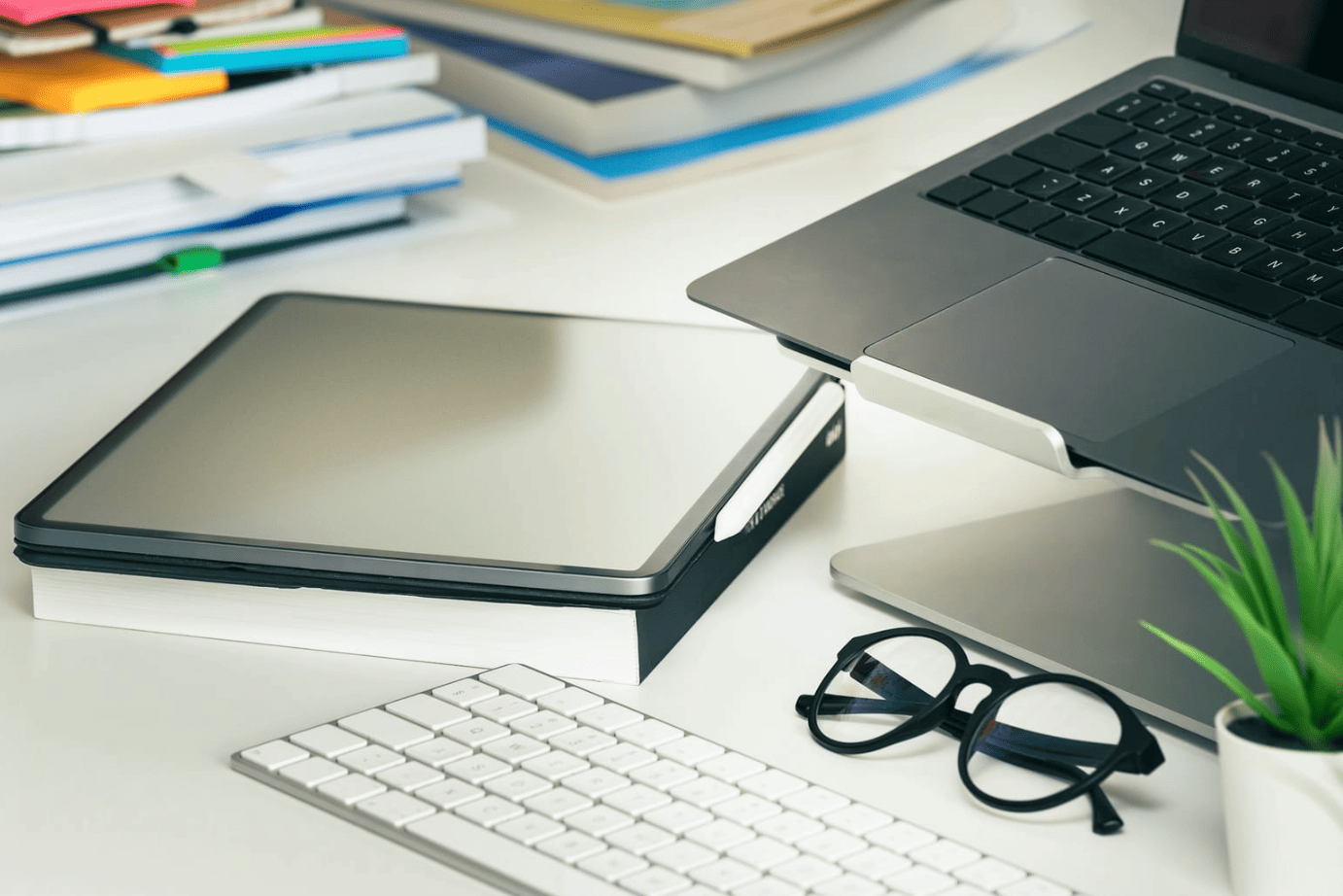 laptop and keyboard with glasses - Internal Linking Tools