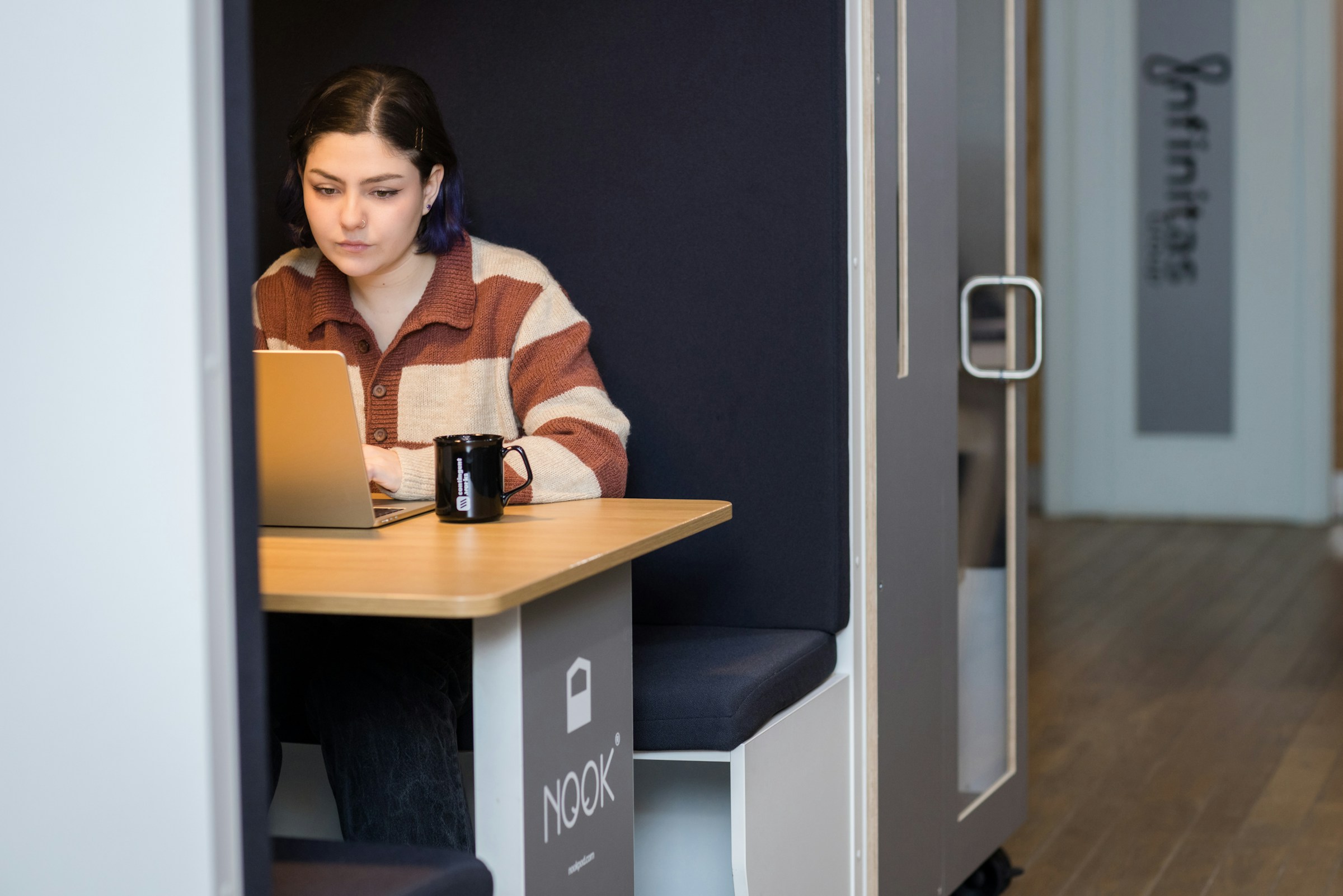 woman working hard on laptop - Marketmuse Alternatives